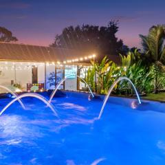 Tropical Oasis with Heated Hydrotherapy Swim Spa