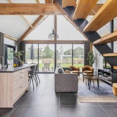 Modern farm lodge stay with pond view