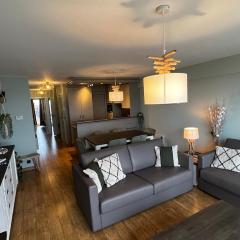 Uniek appartement met zeezicht en privé garage