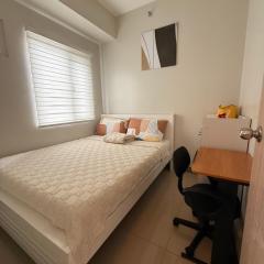 Urban Oasis 2BR Condo with Multiple Pools at SMDC Charm Residences