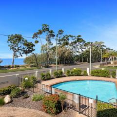 Bright Coastal Stay with Pool and Beach View