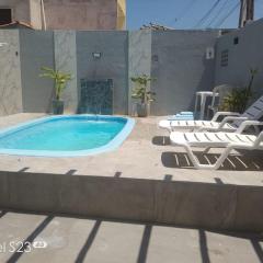 Casa com piscina e área gourmet em Arembepe
