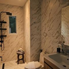 Charly Apartment - 2BR Seaview Cozy Apartment