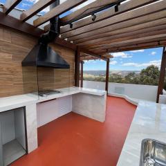 Casa com ar condicionado, churrasqueira e rooftop