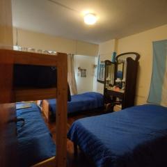 Cama en habitacion compartida