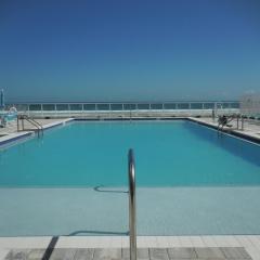 Beachside Bliss Ocean-View Condo with Pool and Private Beach Access Perfect for Families and Couples