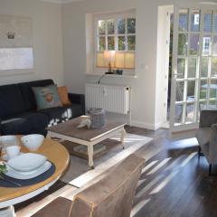 Geschmackvoll ausgestattete 2-Zimmer-Wohnung im EG eines typischen Reetdachhauses