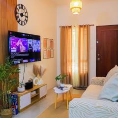 Cozy Three-Bedroom Staycation House with Netflix, Wi-Fi, and Free Parking Garage near SM Caloocan