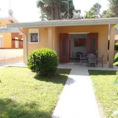 Family villa with private garden near the beach