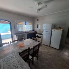 Linda casa com piscina pé na areia