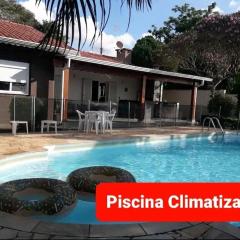 Casa Varanda Por do Sol - Piscina Climatizada - Dentro da Cidade
