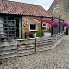 Larch Cottage Ruston with hot tub, dogs go free