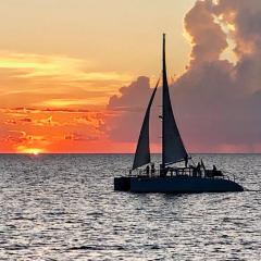 Waterfront Retreat! Breathtaking Water Views - Sparkling Pool & Dock - Walk to the Beach!