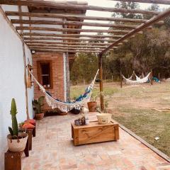 Casa de campo com pôr do sol incrivel