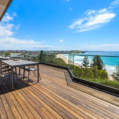 Morning Glow - Wake up to breathtaking views and golden sunrises at this serene coastal retreat.