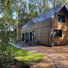 NIEUW Eco design bosvilla met sauna en xl tuin