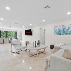 Bright Fort Lauderdale Villa with Private Heated Pool, Modern Décor and Palm-Lined Outdoor Oasis