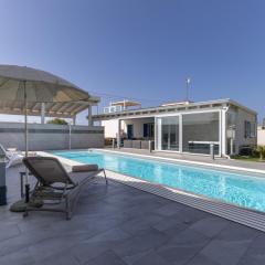 Villa Maria con piscina riscaldata