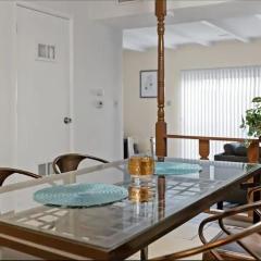 3-bedroom building in serene Saint Ann with WiFi, AC