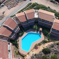 Casa Le Rocce con piscina condivisa