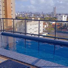 Flat com piscina na cobertura em Intermares