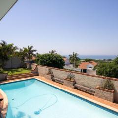 Spacious 4-Bedroom Coastal Haven with Sea Views