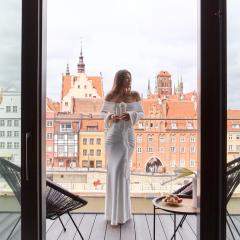 DEO PLAZA Suites & Riverside by Downtown Apartments