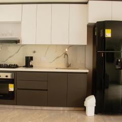 Frente a Viva Envigado, AC, moderno e iluminado