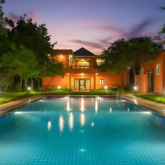 StayVista at Petals Of Dusk - Outdoor pool, WiFi & BBQ