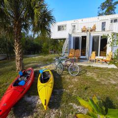 Upcycled Shipping Containers Transformed into a Glamping Home for a Unique Florida Vacation