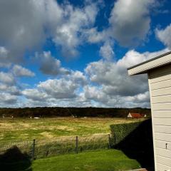 Breskens Chalet DuneView mit Zaun Haus Nr H195