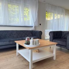 Moderne Familienwohnung mit Garten & E-Ladestation