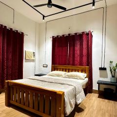 Santo Bambino Homestay - Neat AC Rooms Close to the Beach