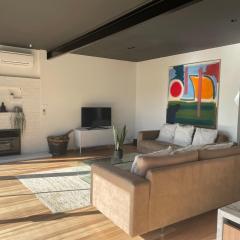 Spacious tree house with stunning harbour views