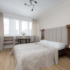 A Unique Studio with a Beautiful View of the Palace of Culture and Science by Noclegi Renters