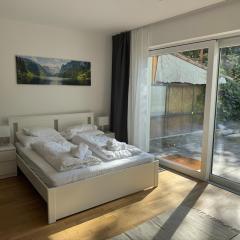 Modern City Apartment with private Garden