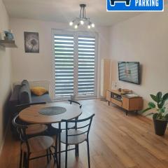 Apartament Bazylek, miejsce parkingowe w garażu podziemnym