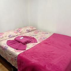 Quarto privado no centro 313