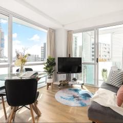 Stylish 2BR City Retreat - Air-Con & Balcony