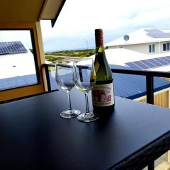 Sandy Toes and Sunsets Beach House