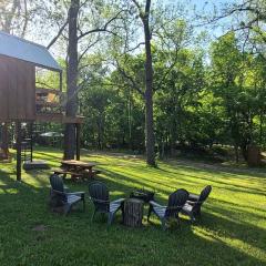 Tree House Glamping Destination near the Ozarks, with River Access for Swimming and Fishing