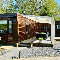 Rustiek bos chalet Sven