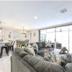 Waterfront 3BR Pool Oasis with Dock, Grill & Lounge