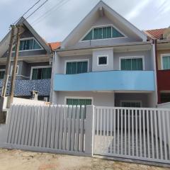 Triplex na praia