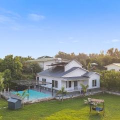 Alaya Stays Nathaniel 3 BHK Pet friendly Farmhouse with Pool & Garden