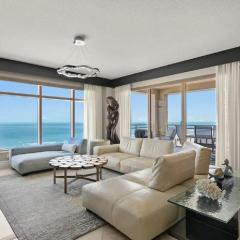 Elegant Three-Bedroom Waterfront Apartment with Bay Views