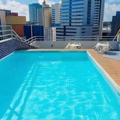 Studio c/ piscina, estac e ótima localização!