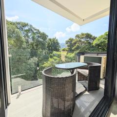 Torres del Mar rainforest-view two-bedroom condo