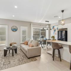 Modern Family Oasis Luxe with Balcony AC and Backyard)