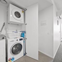 Sleek 2-Bed Apartment with Rooftop Garden Access